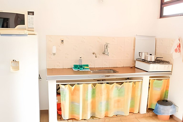 Flat 5 pessoas,pet Friendly, cozinha completa,perto da Praia